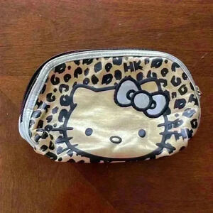 Rare Hello Kitty gold, silver and black pouch bag